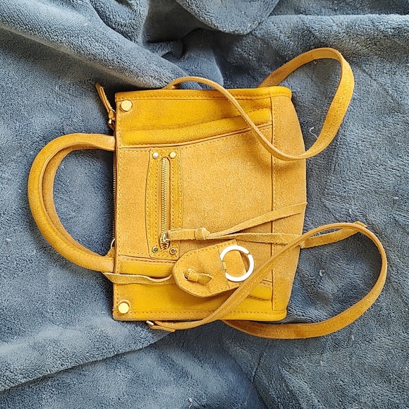 H&M Handbags - H&M suede tan mini crossbody bag. Good used condition.